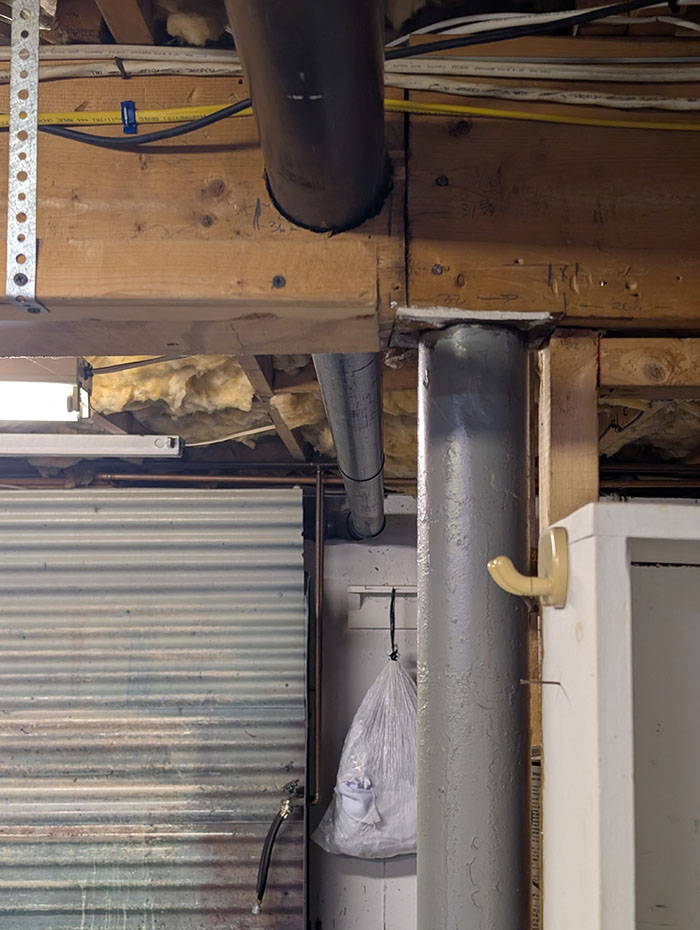 A1 Foundation Crack Repair - Did a plumber really drill a 6-inch pipe through a home’s main support beam?